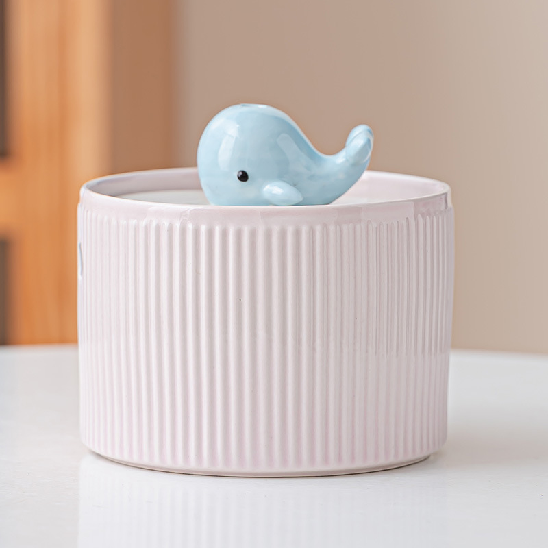 Petit rose clair en forme de baleine 1,0L