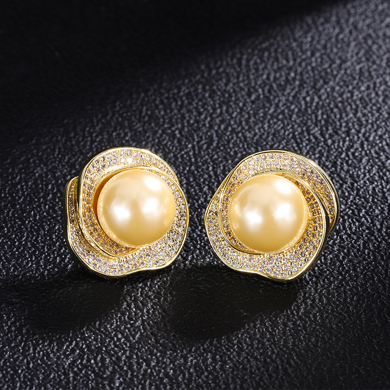 Gold stud earrings