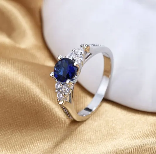 Dina New Arrival Claws Edelstein ringe Silber Farbe Blau Saphir Zirkon Diamant Verlobung ringe für Frauen Schmuck