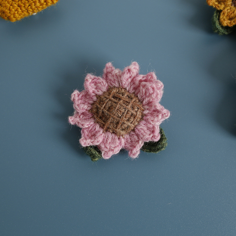 Broche tournesol rose