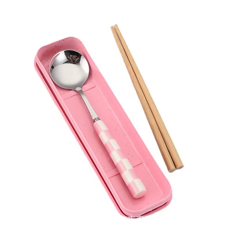 Porte-baguettes rose à carreaux en forme de cuillère