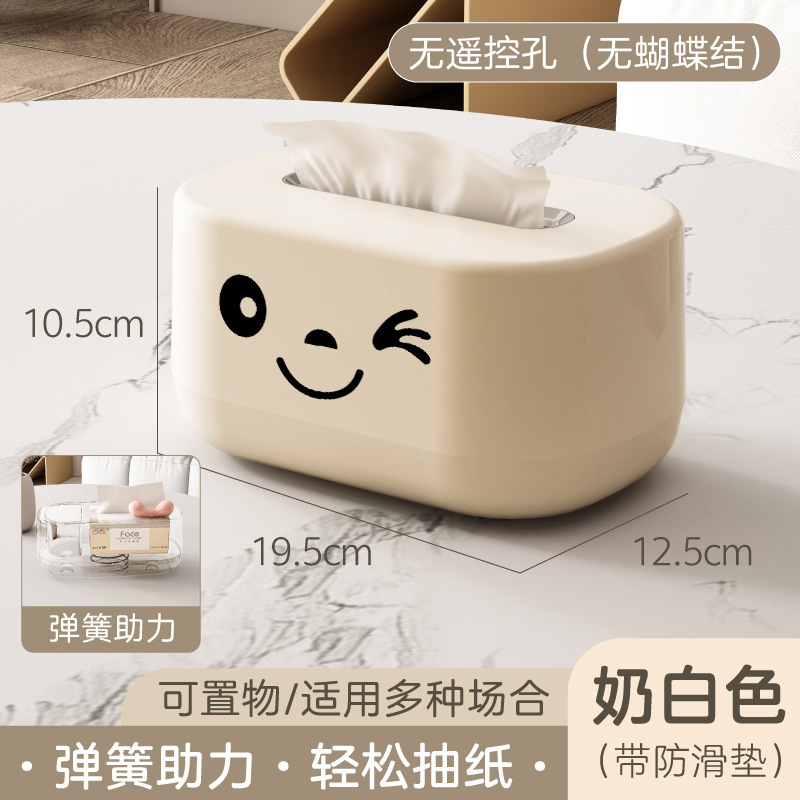 Off-white tissue box with small stickers and no bow