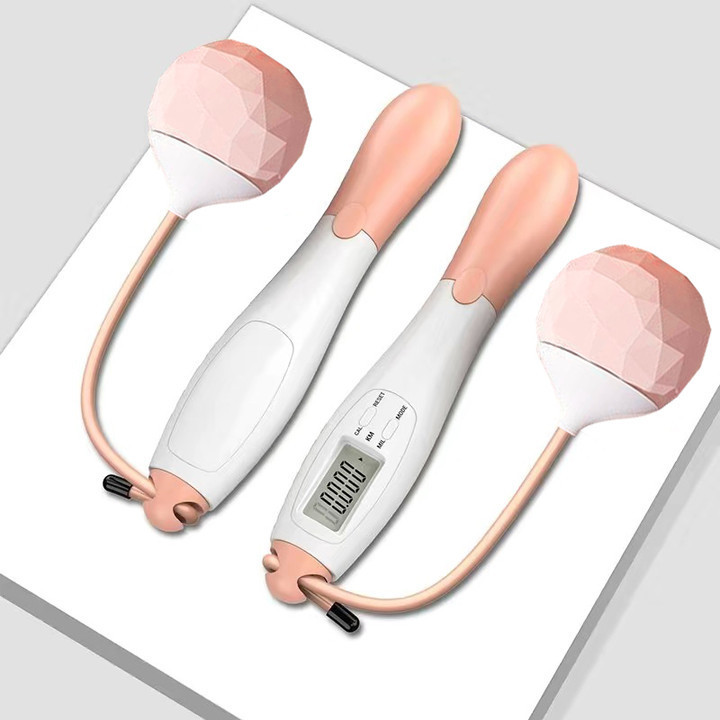 Poignée rose et blanche avec corde et petite boule