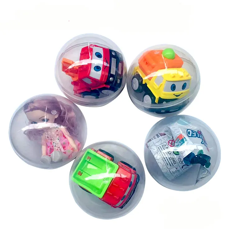 47mm * 55mm klare Kugeln mit verschiedenen Spielzeugen Zufällige Mischung Überraschung Ei Kunststoff Siamesische Kapseln Spielzeug für Verkaufs automaten