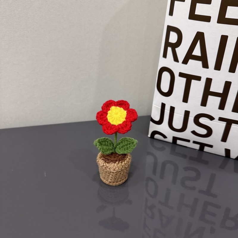 Produit fini-petite fleur rouge en petit pot