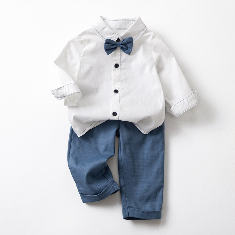 Ensemble deux pièces pantalon bleu foncé et chemise blanche Q2419