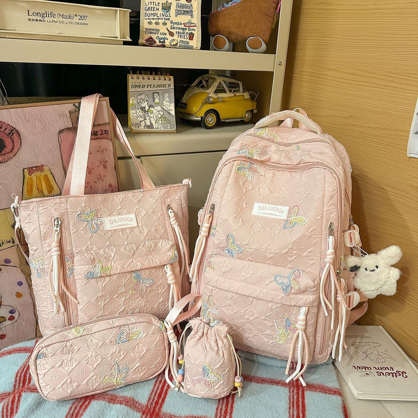 Sac à dos rose + porte-monnaie