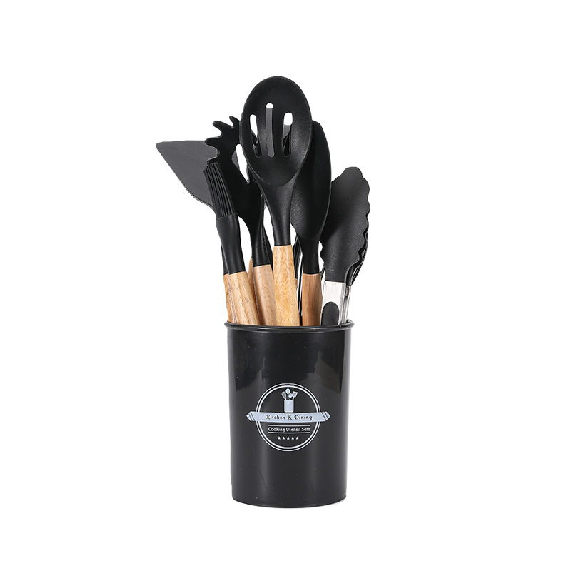 Juego de 12 utensilios de cocina negros.
