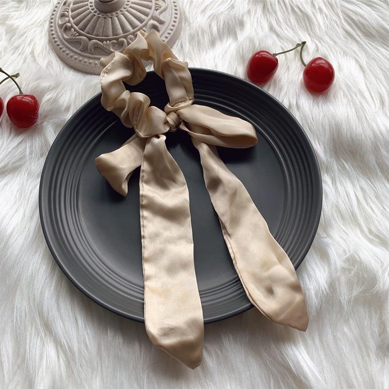 ริบบิ้นโบว์แหวนลำไส้ใหญ่สีเบจ