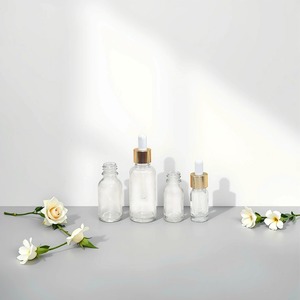 Para Venda Clear Flat 5ml <span class=keywords><strong>10ml</strong></span> 15ml 20ml 30ml 50ml 100ml Vazio Redondo Cilindro Garrafa Conta-gotas De Vidro Garrafa De Óleo Essencial