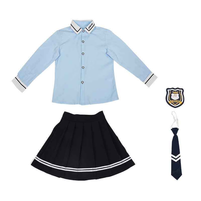 Chemise bleue + jupe rayée noire + cravate bleu marine + badge