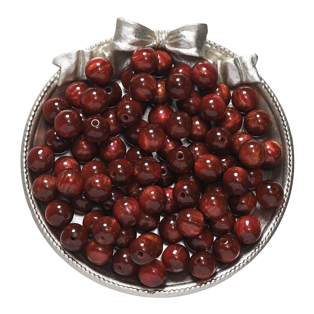 Resin cat's eye beads - red