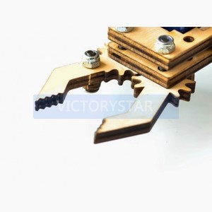 4degreeoffreedom wooden servo robot arm SG90 <strong>Raspberry</strong> <strong>Pi</strong> claw splicing robotic arm4 MG90SThere are slight modifications and the