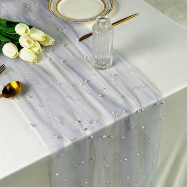 Purple gauze and white beads