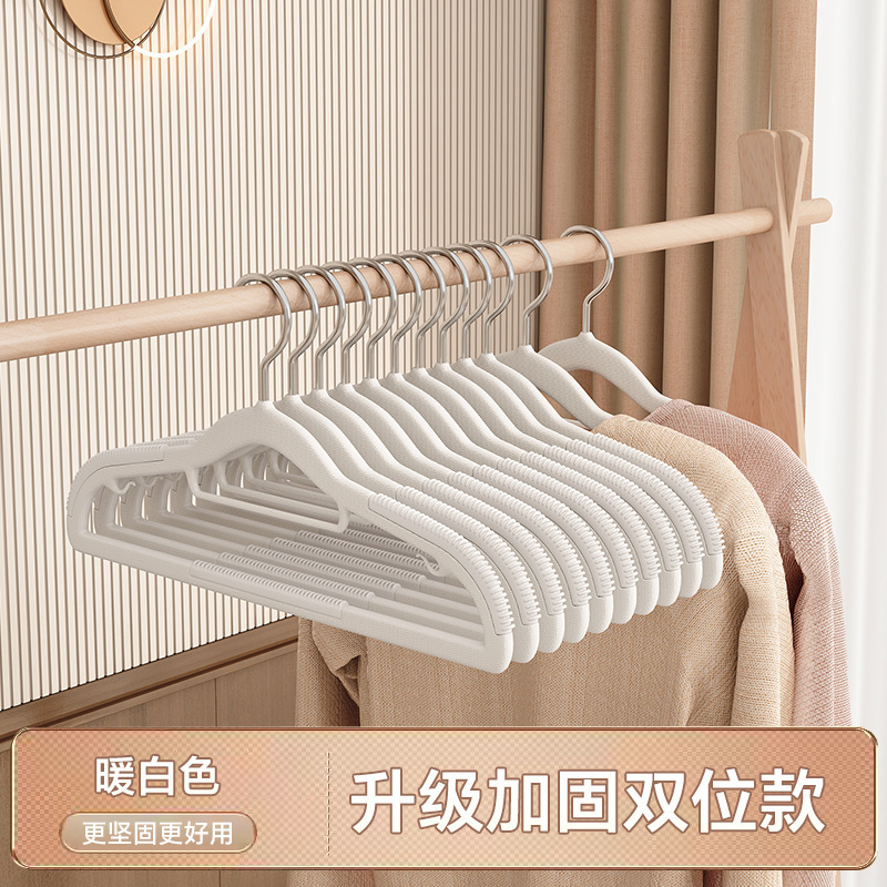 Double-sided design in warm white.
