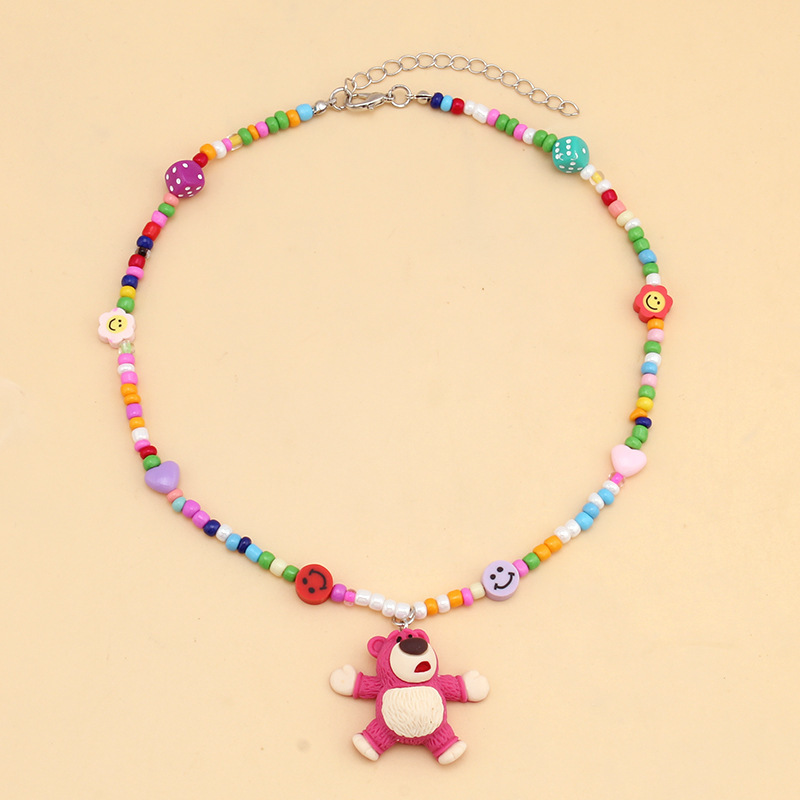 Collier de perles de rocaille ours fraise