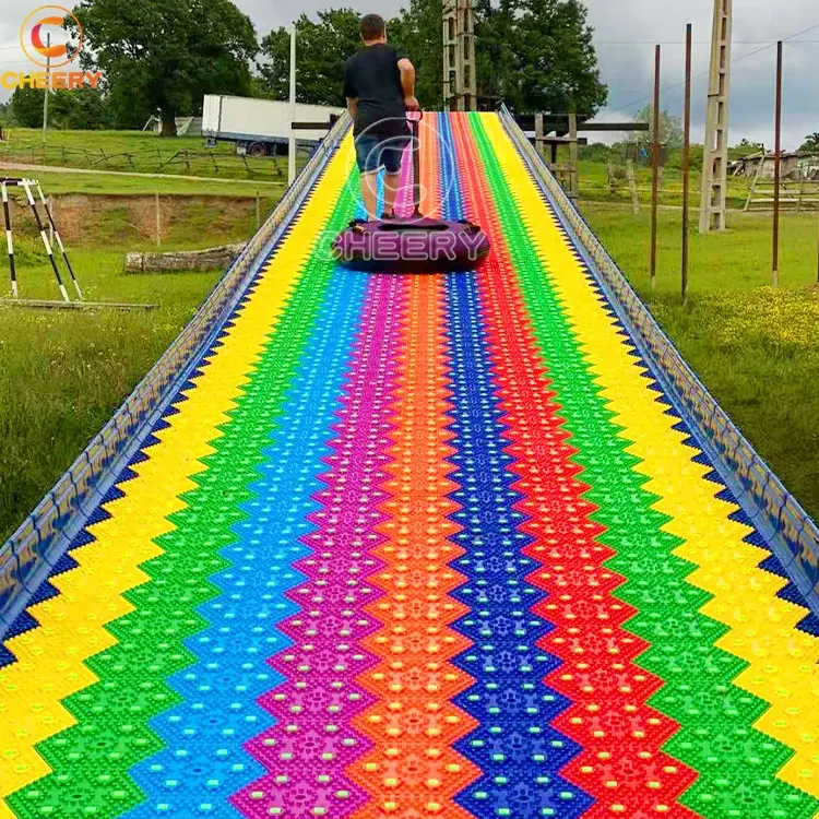 Nieuw Product Outdoor Speeltuin Amusement Games Kinderen Gras Glijdende Manier Regenboog Droge Sneeuw Glijbaan Te Koop