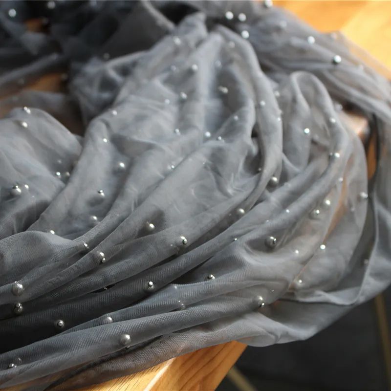 dark gray yarn highlight silver beads