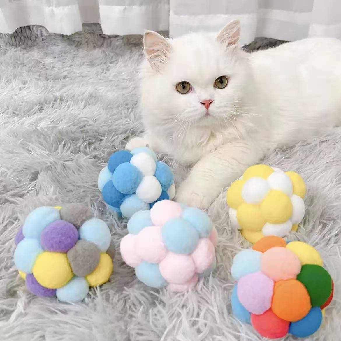 Grosse boule en peluche