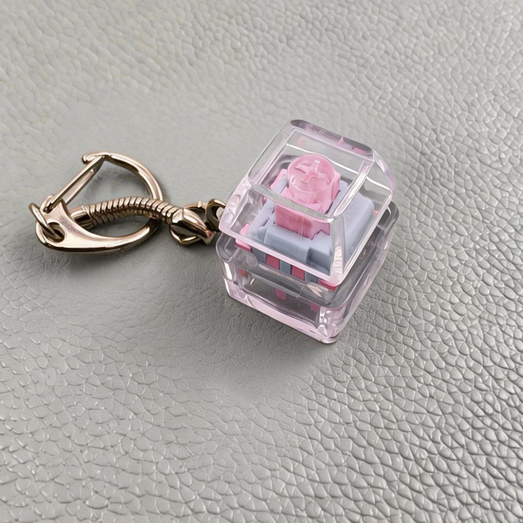 1 llave transparente+rosa