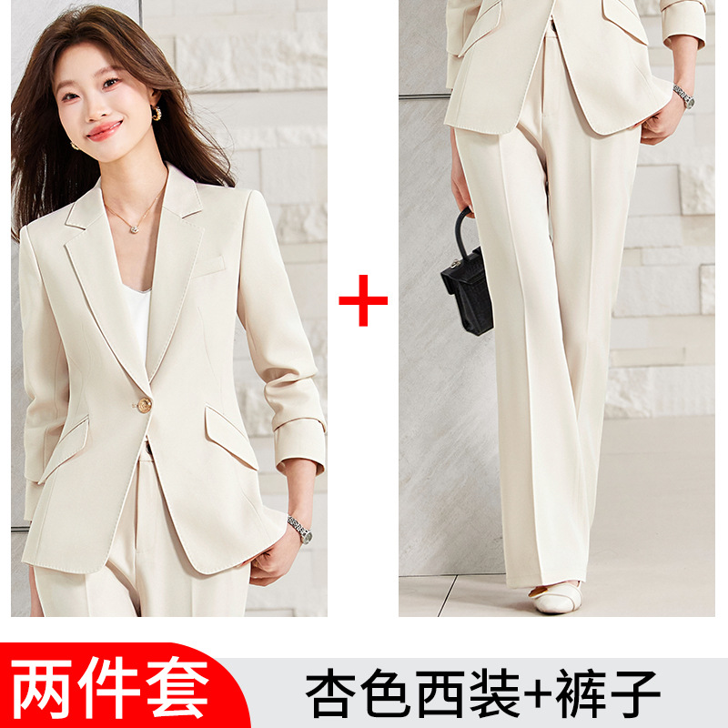 apricot-colored suit with slightly flared trousers