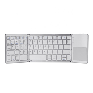 Precio barato de fábrica Mini teclado Bluetooth inalámbrico portátil triple plegable 63 teclas incorporado 140mAh batería Teclados - Product Image 3