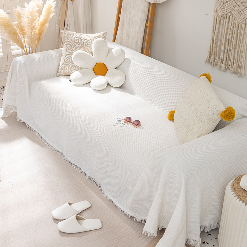 Housse de canapé motif gaufré - blanc cassé