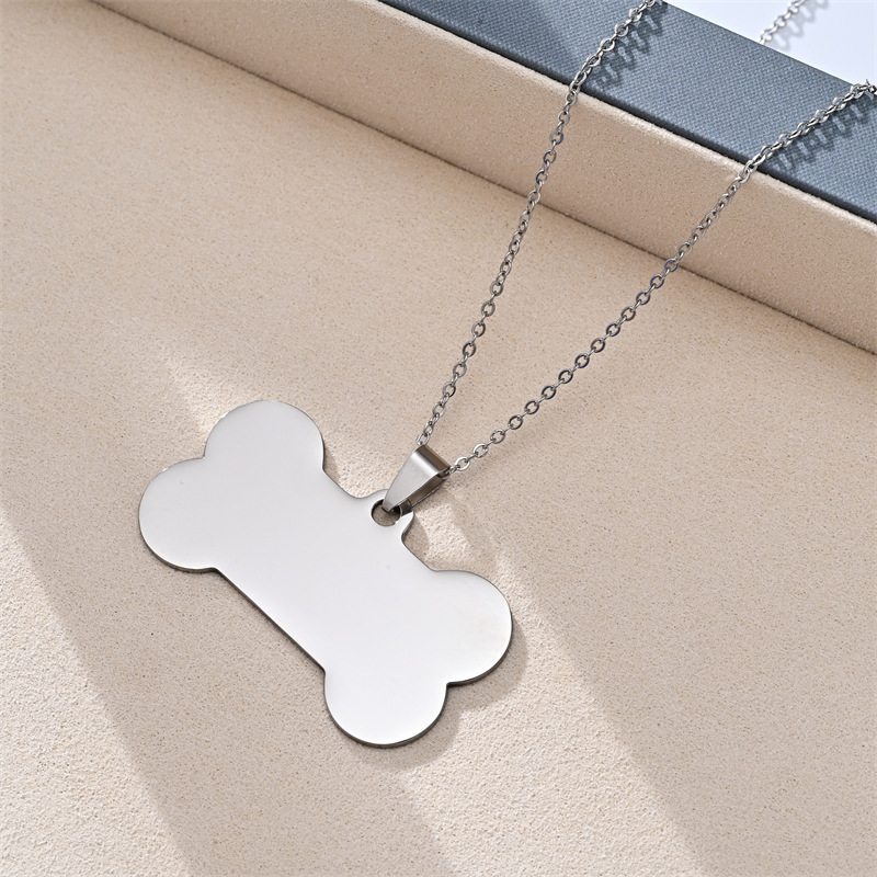 Pendentif chaîne 04X50, os de chien 2,7X5, couleur acier