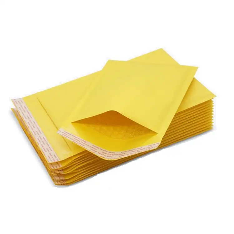 Bolsa de sobre de burbujas de papel Kraft amarillo compuesto, bolsa de embalaje de burbujas blancas, bolsa exprés de logística anticaída, envío gratis