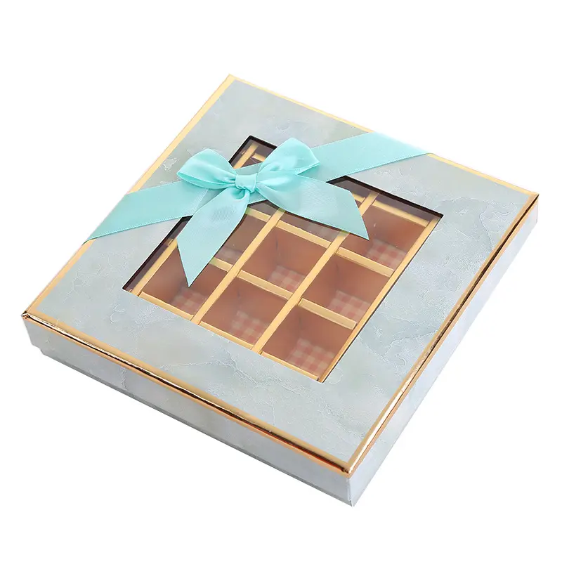 Boîte d'emballage en papier cadeau bonbon chocolat couvercle et base marbrés avec fenêtre transparente et nœud papillon