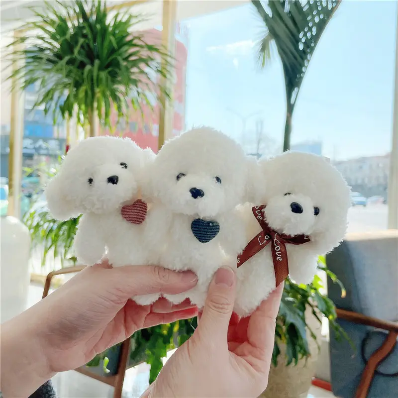Cane bianco carino morbido Mini giocattolo peluche orso portachiavi accessori di piccole dimensioni farcito morbida bambola di pezza in miniatura