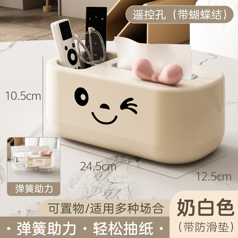 Off-white tissue box with large bow stickers