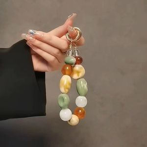 韓国レトロ織りビーズブレスレットキーチェーンクラシック携帯電話ストラップイヤホン付きペンダントバッグアクセサリー