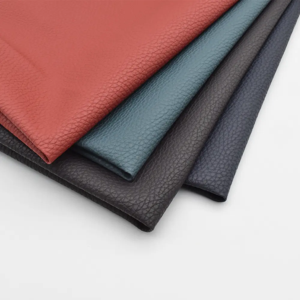 Tela de cuero sintético de PVC Rexine al por mayor Vegan Litchi Lychee Faux Leather para decoración del hogar, tapicería de asiento de coche