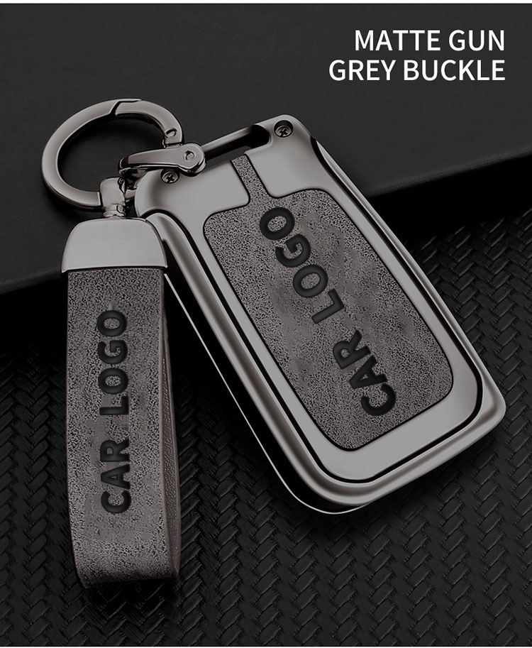 Pistolet en métal gris + porte-clés en cuir