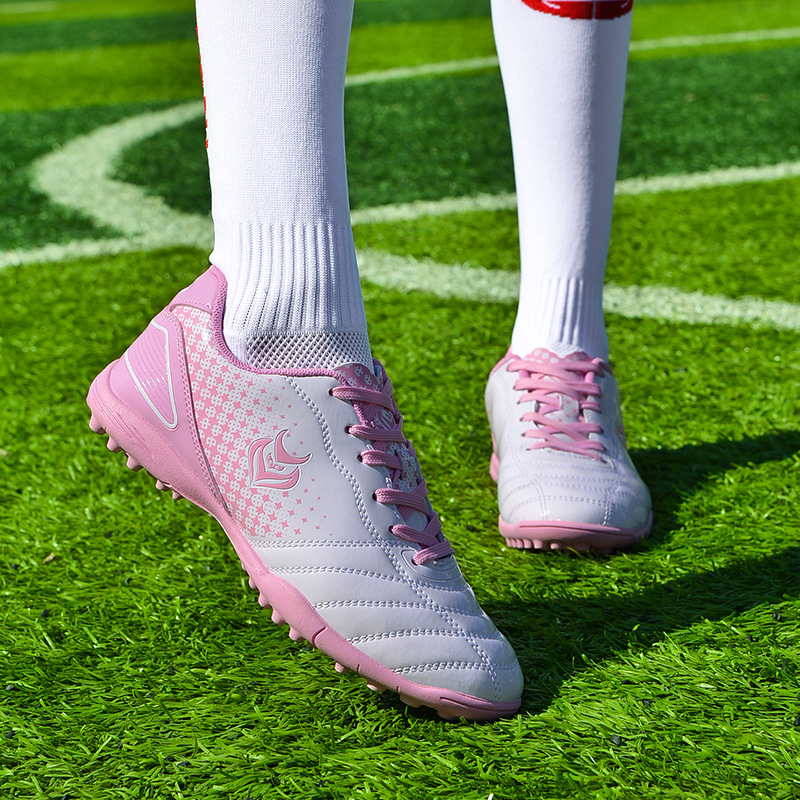 Crampons pour gazon blanc et rose
