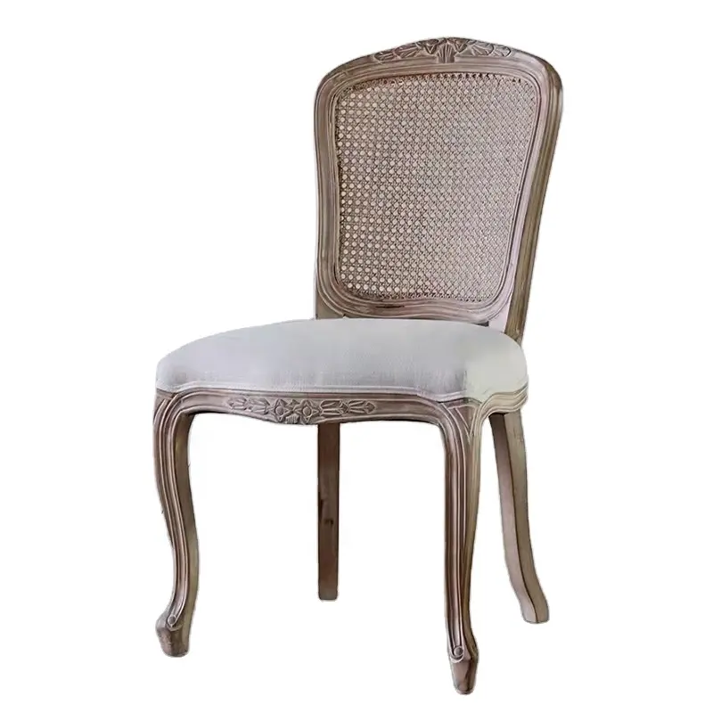 Silla de comedor de ratán tallada en la espalda estilo europeo Louis, silla de estilo francés con marco de madera