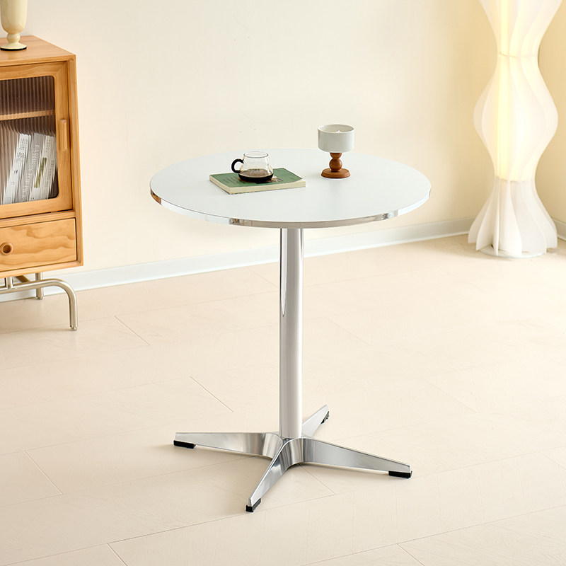 mesa blanca+mesa redonda con borde plateado