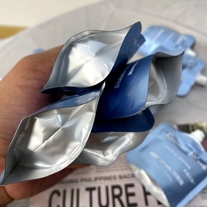 SACカスタマイズされたプリントスパウトノズル液体クリームローションポーチ独自のアルミホイルプラスチック包装袋を設計する