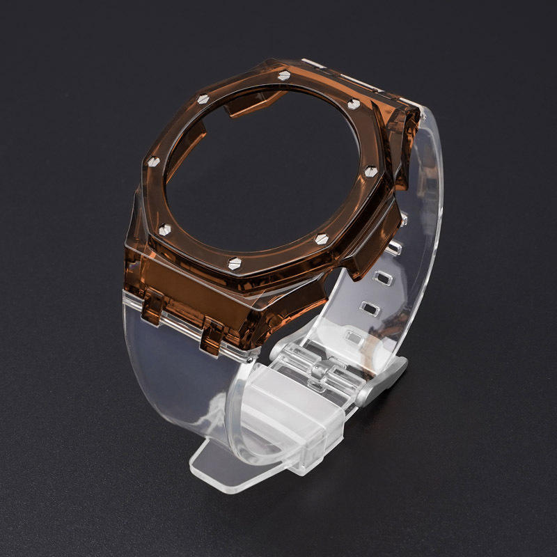 Estuche marrón-correa transparente con herramientas.