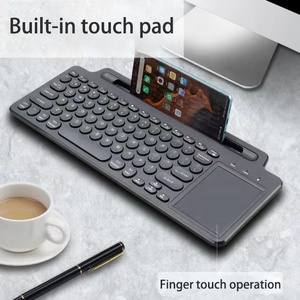 Teclado BT con panel táctil inalámbrico OEM 2,4G con soporte incorporado y fácil control de medios para tableta/teléfono/computadora portátil de oficina
