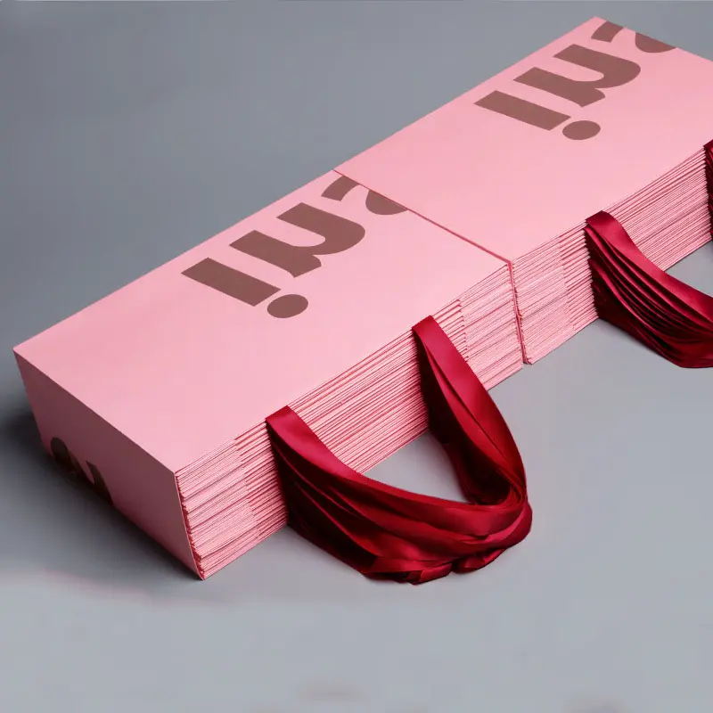 Individuell bedruckte personal isierte rosa Retail Shopping rosa Papiertüte mit Band griff