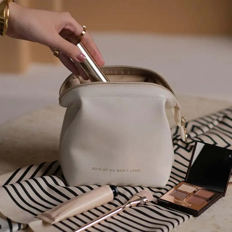 Yeni ürün Pu tuvalet fermuarlı çanta makyaj çantası PU deri makyaj çantası seyahat su geçirmez kozmetik çantaları ve kılıfları