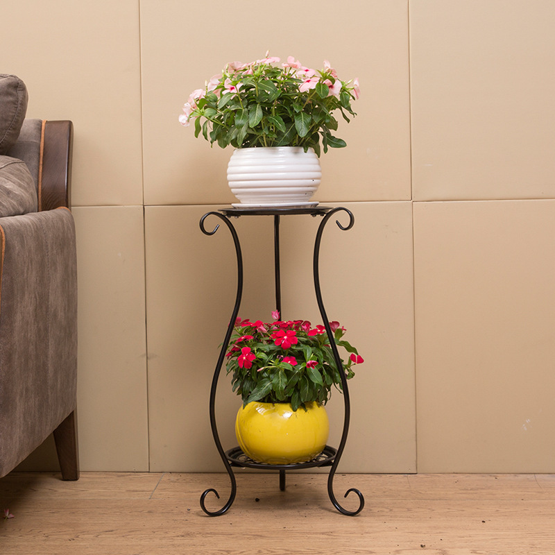 Black vase, 60cm tall, with small dish -- Property purchase