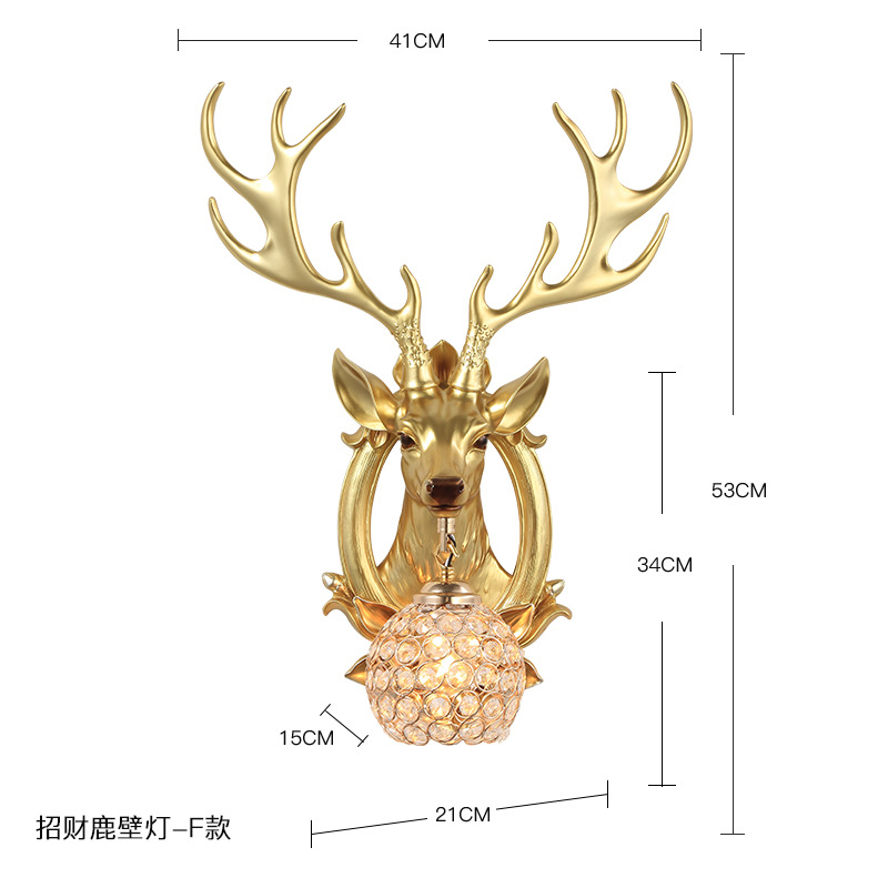 Lampe cerf de bon augure abat-jour rond doré