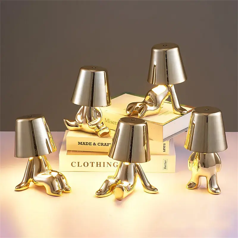 Moderne wiederaufladbare, touch-gesteuerte, dimmbare italienische Denker-Tischlampe goldene Mann-Chromelampe