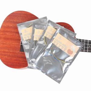 Cuerda de ukelele colorida OEM con cuerdas de ukelele de nylon empaquetadas a granel de alta calidad - Product Image 1