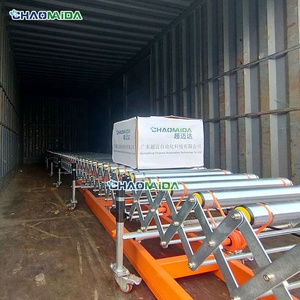 Transportador de carga y descarga de contenedores, para comercio electrónico