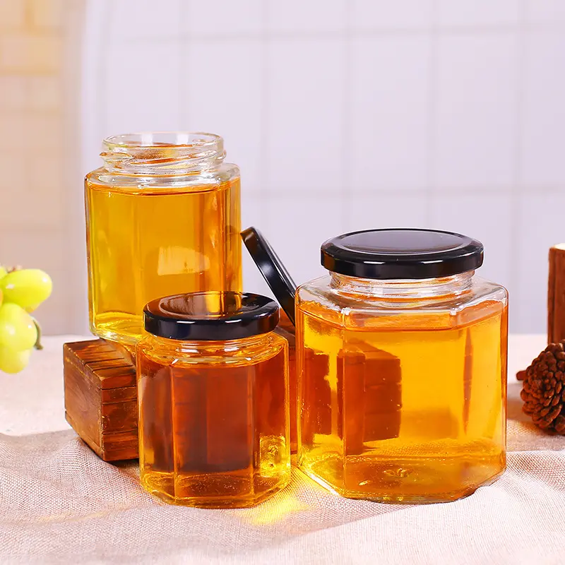 Pots à miel hexagonal en verre avec couvercle, vente en gros, bonne qualité, 4 pièces