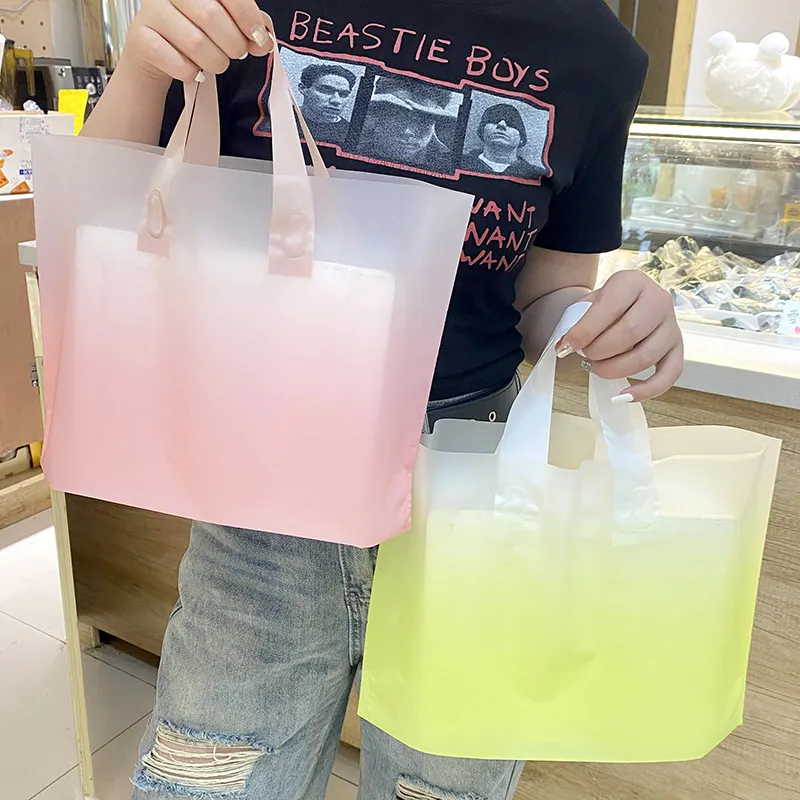 Imballaggio di abbigliamento sfumato riutilizzabile borse per la spesa in plastica colorata in polietilene borse personalizzate con borsa per il trasporto di Shopping di lusso con Logo